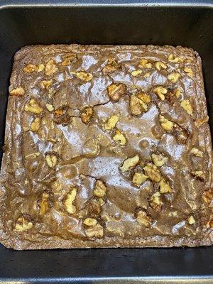 Tray of OG brownies topped with toasted infused walnuts