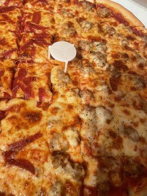 Sausage and pepperoni pizza