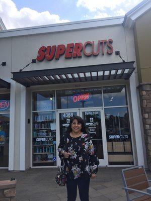 My mom in front of Supercuts Bonita road.