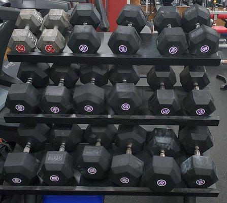 Our eight (8) racks of dumbbells go as high as 115 pound pairs.