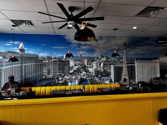 Mural with eggs on top of Las Vegas famous places.