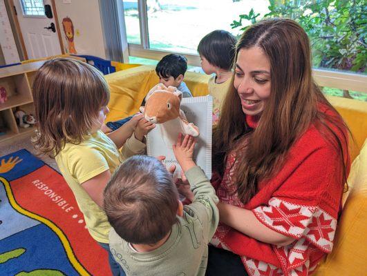 Teacher interacting with children