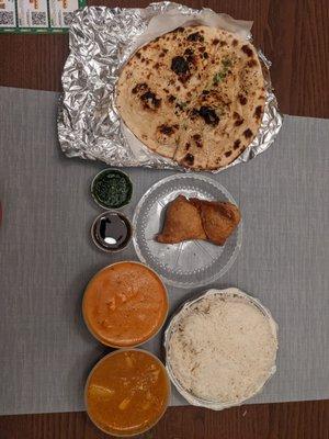 Garlic naan, chicken tiki masala, samosa, chicken vindaloo