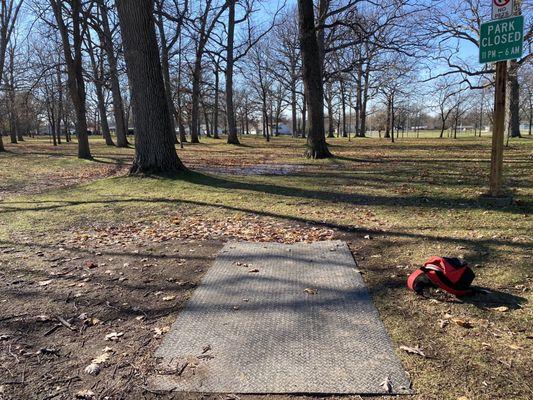 Hole 9 (no signage on this hole) with some water / mud that formed from yesterday's thunderstorm