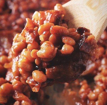 Homemade baked beans simmered in a brown sugar vanilla sauce