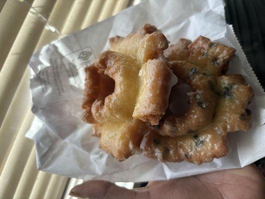 glazed old fashioned donut and a blueberry old fashioned donut.