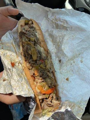 Cheesesteak with mushrooms, peppers and onions