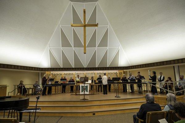 The bell choir playing at the reopening of the new Sanctuary in November 2022