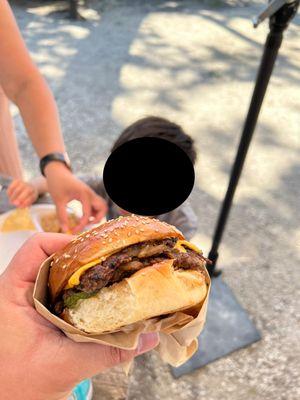 Double double burger with pickles, onions and special sauce