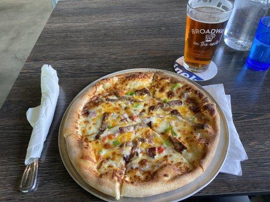 Brisket pizza with beer