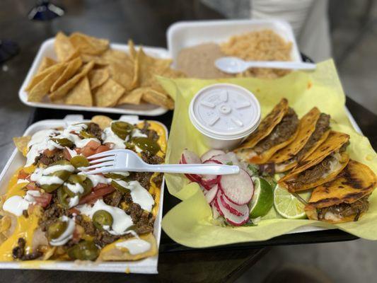 Birria taco plate, nachos, chips, rice & beans