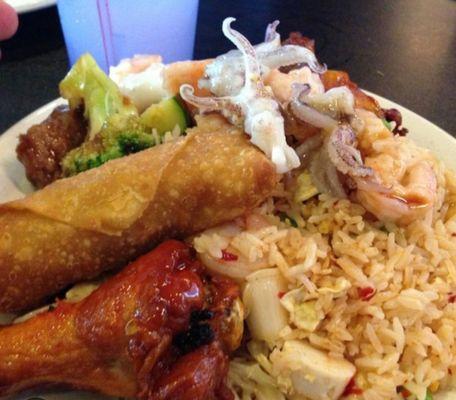 Egg roll, chicken wing, Beef & Broccoli, and Fried Rice