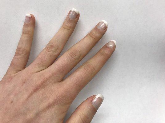 This is my gel french manicure 2 weeks in.  I have never had a manicure last this long.  Excellent work!