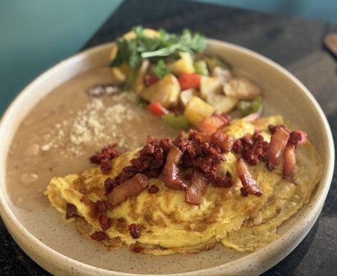 Meat filled omelet with bacon and chorizo! So good!!