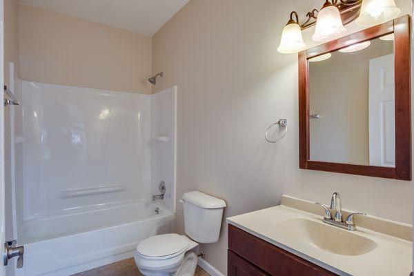 fresh shower surround and glazed tub to give this bathroom a full makeover