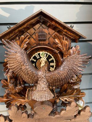 This cuckoo carver added  hundreds of feathers to the Back of this clock's crown. Amazing detail saved for the lucky purchaser