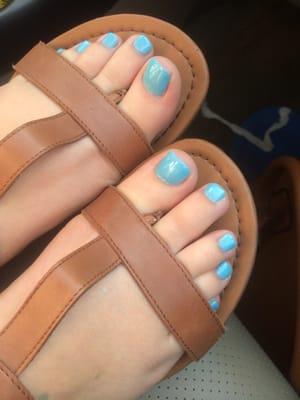 Sky blue with blue glitter top coat toe nails