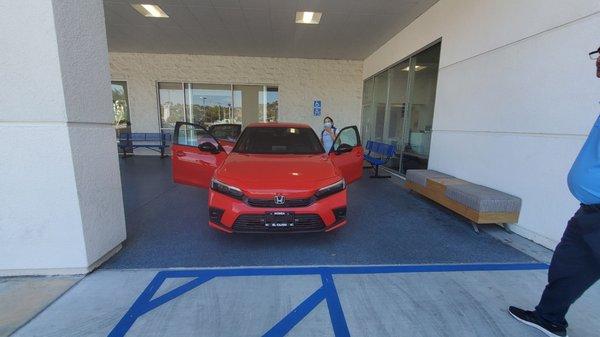 My daughters Brand new 2022 RED Honda Civic Sport Sedan with Massood.