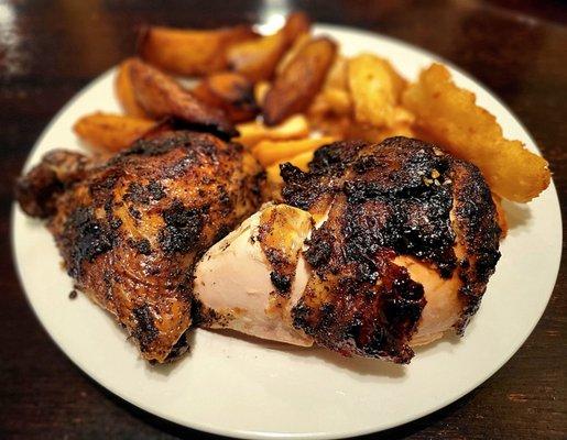 1/2 Peruvian chicken (dark meat) serving with fried plantains and fried yucca.