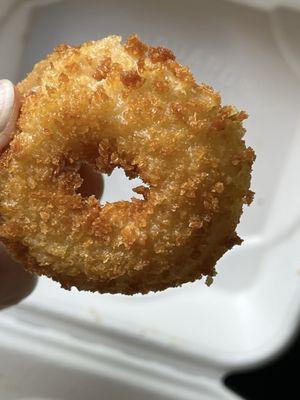 One of the smallest of the onion rings look at that crispy yum!