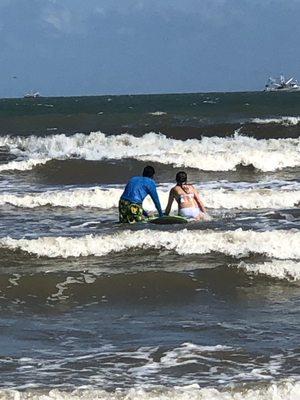 Anthony Teaching my 12 year old and I how to surf! He was great!