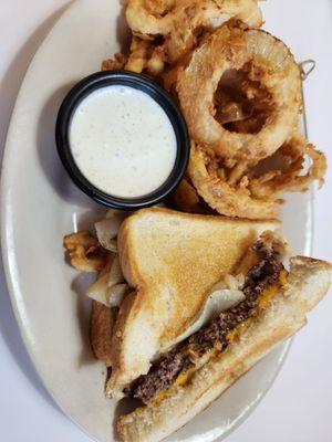 Patty Melt with onion rings and ranch.