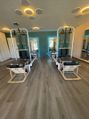 Equipment Pilates including tower, chair, mat and MOTR pilates