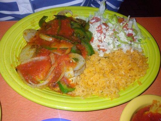 Lunch 13: Pollo Borracho. Grilled chicken with peppers, onions, and sauce on top, salad, and rice.