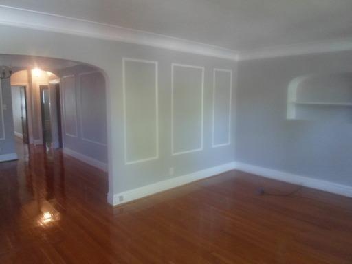 This is an example of the work our crew is capable of.  We patched, customed painted and re-finished the hardwoods here.