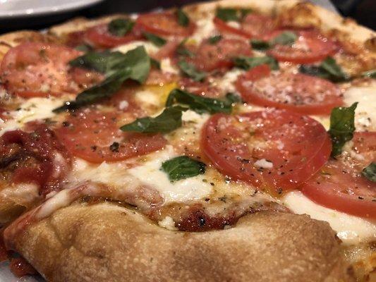 Tomato Basil Pizza with a red sauce instead of pesto, delish