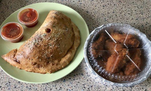 Meat Calzone and hot buffalo wings! Delivery was fantastic and quick!