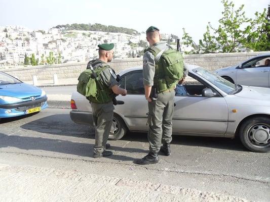 Israeli boder patrol checking passports