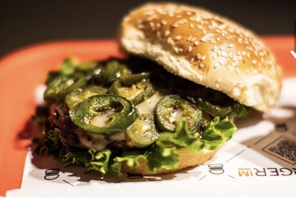 Spanish burger with freshly grilled jalapeños, lettuce, pepper Jack cheese and habanero aioli.