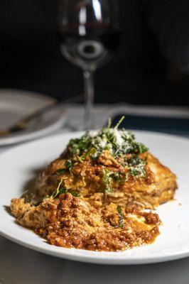 LASAGNA CLASSICA
 Homemade layer pasta with Bolognese sauce, bechamel crispy arugula