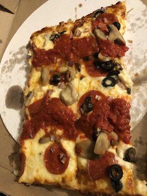 Mushroom, pepperoni, onion, black olives and extra cheese.