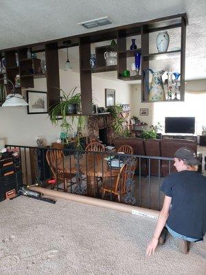 Dad teaching son some flooring