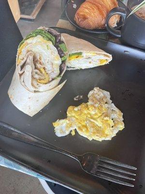 Breakfast burrito with a side of egg