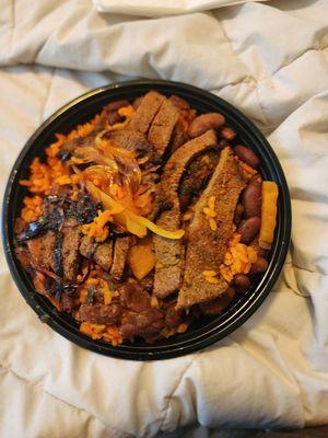 My Bowl The steak and rice and beans Bowl topped with grilled onions