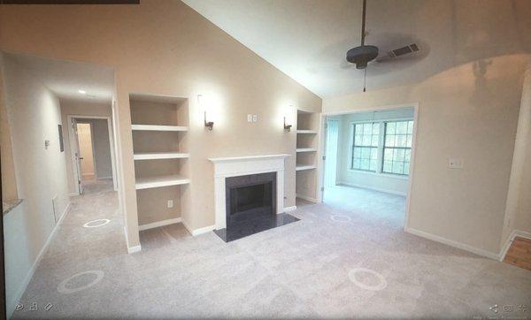 Family/living room with views of sunroom