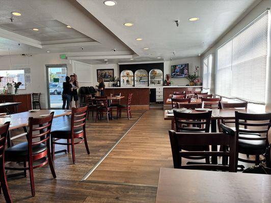 Indoor seating with ample space for office parties. High heels clack loudly on the hardwood floor.