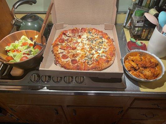 Nick's Pizza, 1/2 Pepperoni and Onion, 1/2 Mushroom and Basil and Nick's Hot Buffalo Chicken Wings.