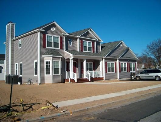 CertainTeed PewterWood Roof, Windows & Doors Mitten Flagstone Siding in Islip NY