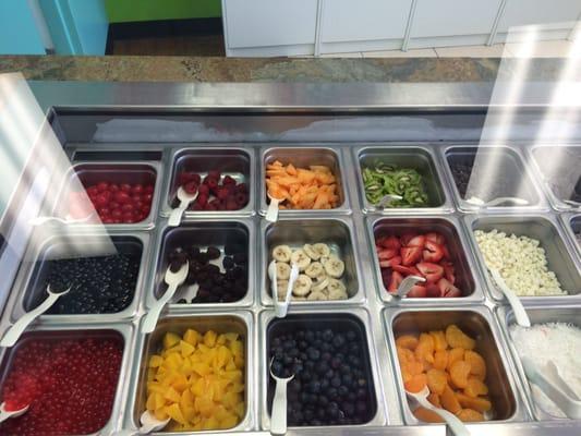 Great topping selection! Love the variety of fruits and premium toppings on the bar here at this Sweet Frog location!!!