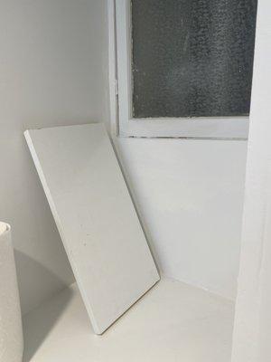 Did not install bathroom shelf