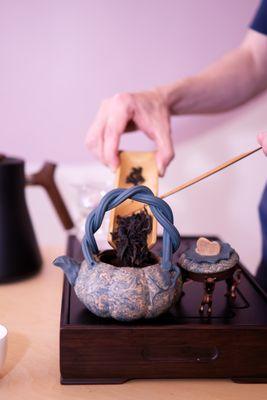 Traditional Chinese Gong Fu Tea service. Our brew mavens will guide you through the process table-side.