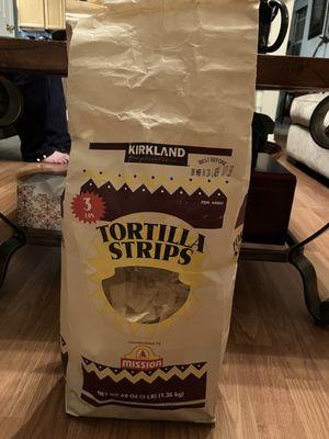 Industrial size 3 pound bag of tortilla chips.