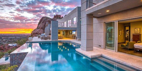 Gorgeous Scottsdale Manor has an infinity pool, movie theater, and dazzling valley views.