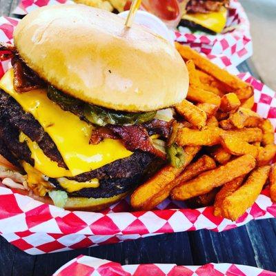 ruffnecker triple cheeseburger with sweet fries.