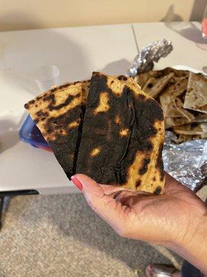 Burnt naan that were inedible