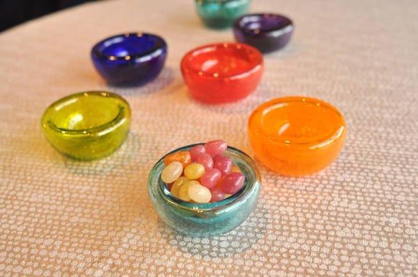 Mini hand blown glass dishes for candy or party favors.